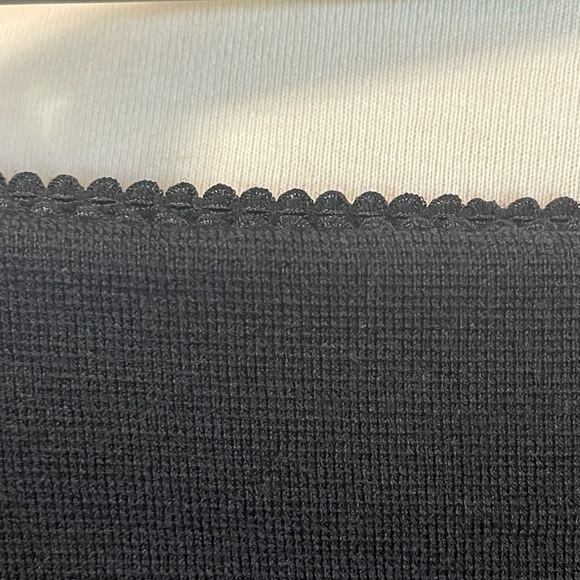 Marc Cain knit black knee length skirt with metallic silver side seams. - Picture 3 of 14